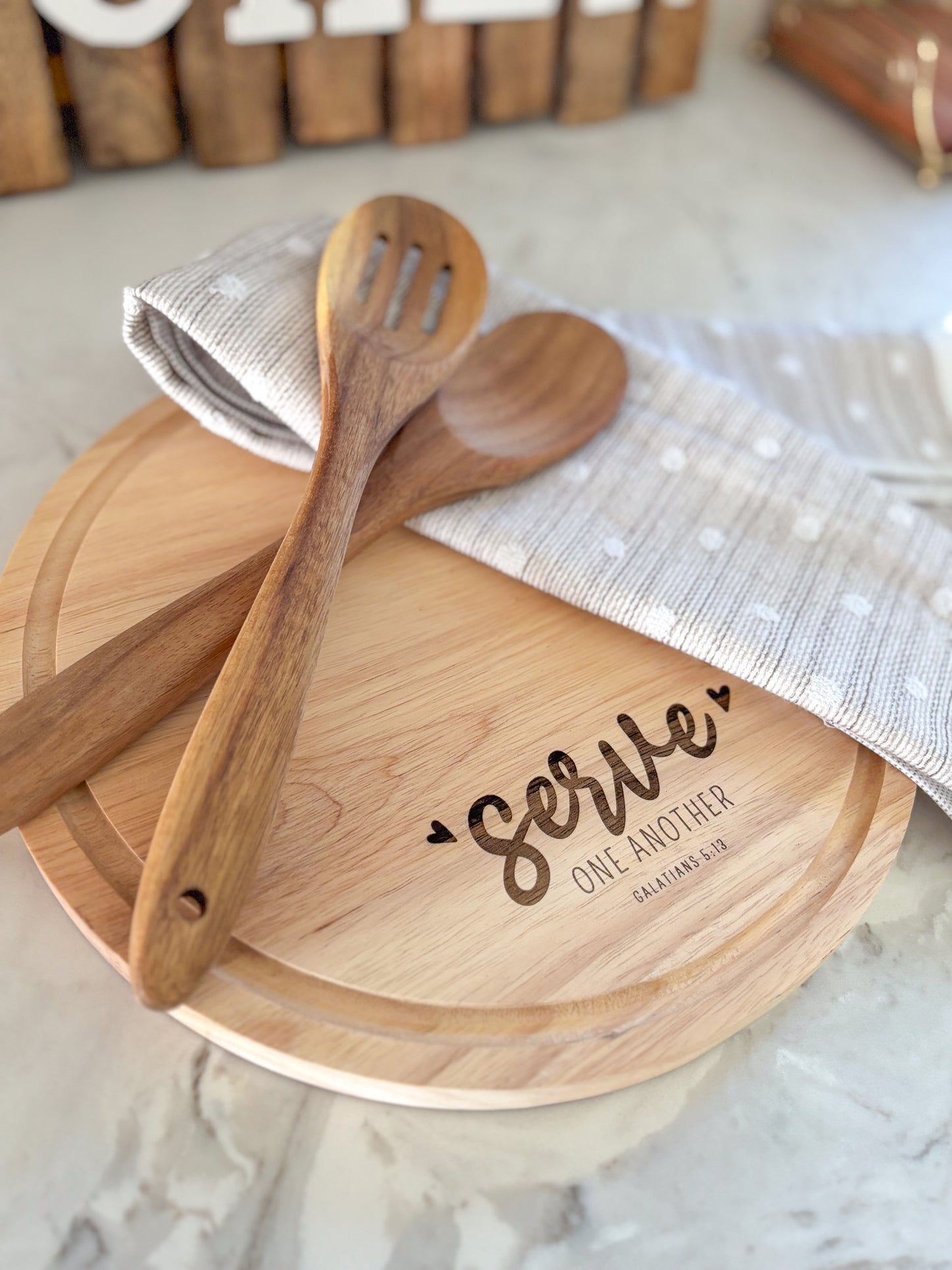 "Serve One Another" wooden board